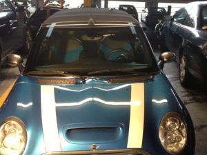 Mini Coopers use the same type of auto glass but a different size.