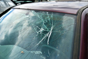 broken windshield on a small car